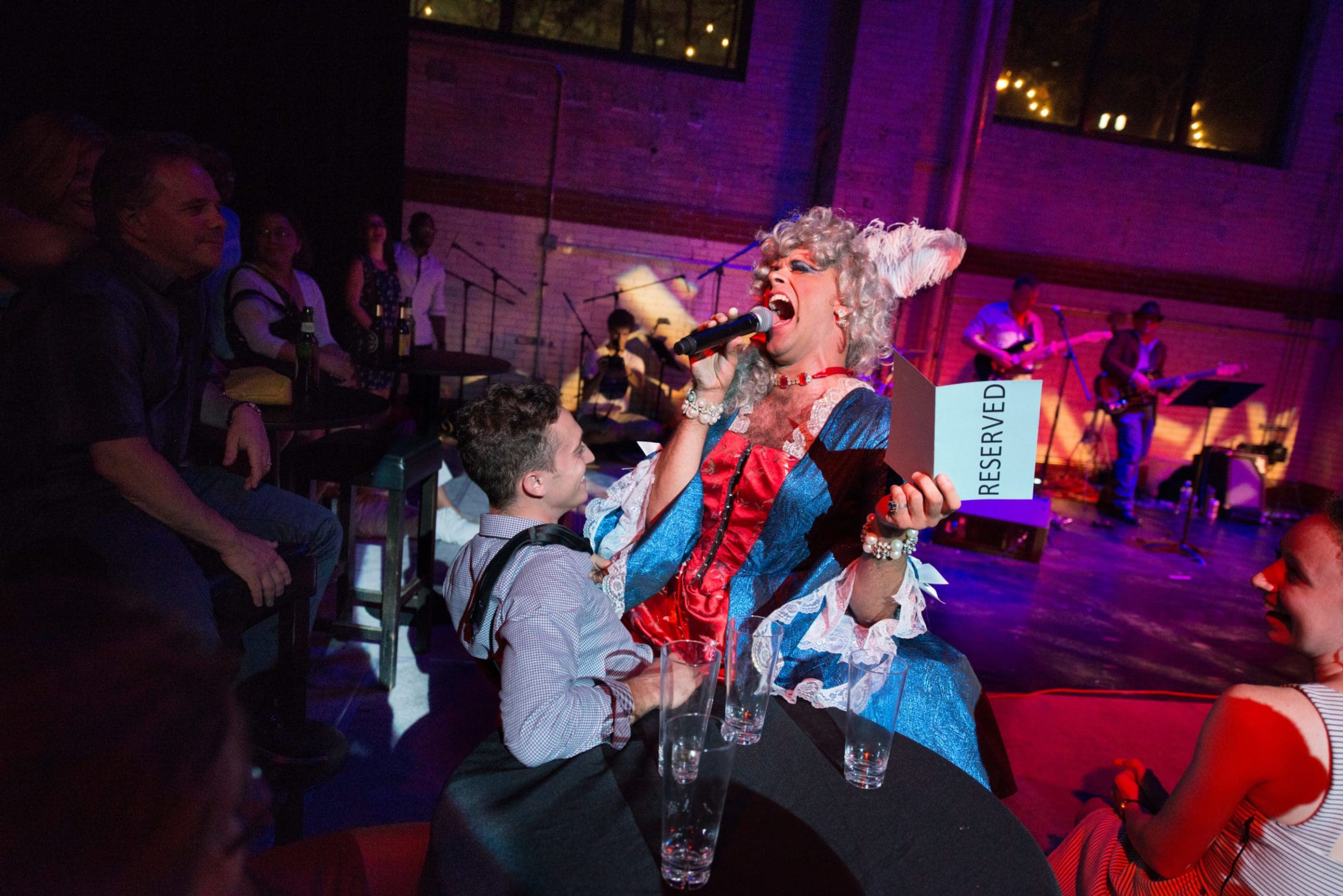 martha graham cracker straddling man while singing